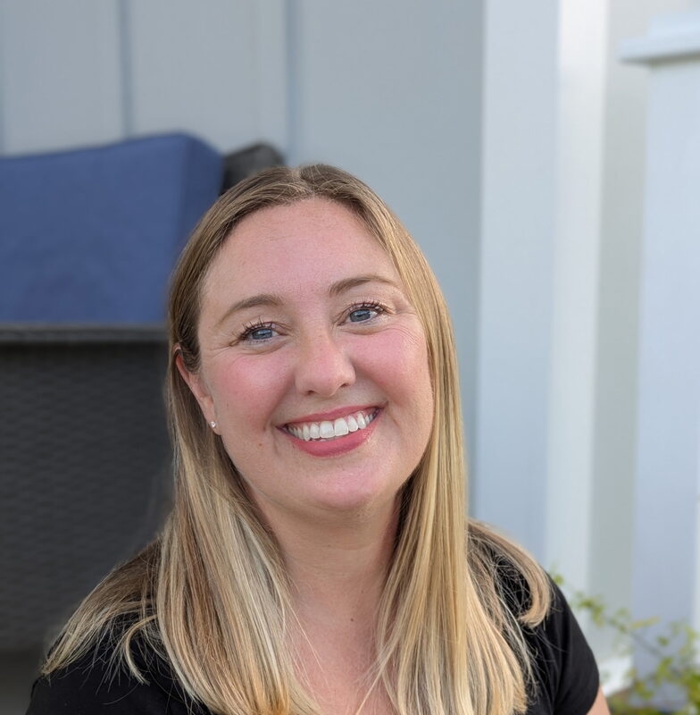 Lauren Roscoe, founder of The Music Treehouse, smiling outdoors